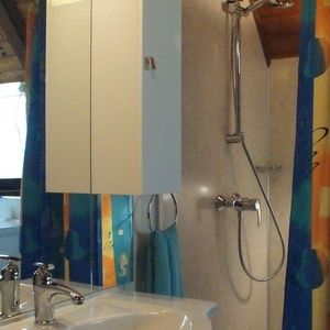 A shot of a sink with cabinet
