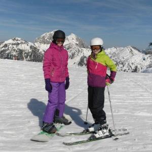 Skiers standing in the snow