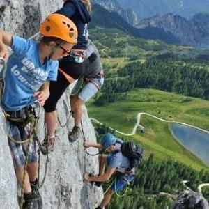 A family climbs the mountain